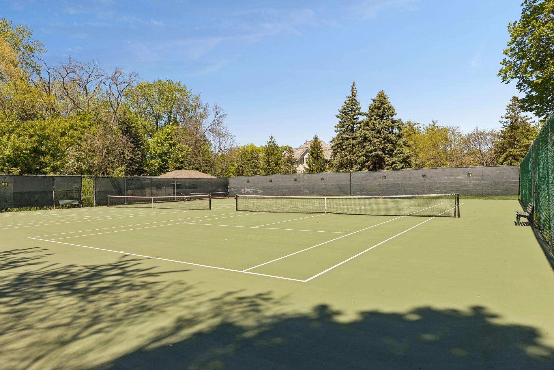 Two private tennis courts for residents to enjoy.