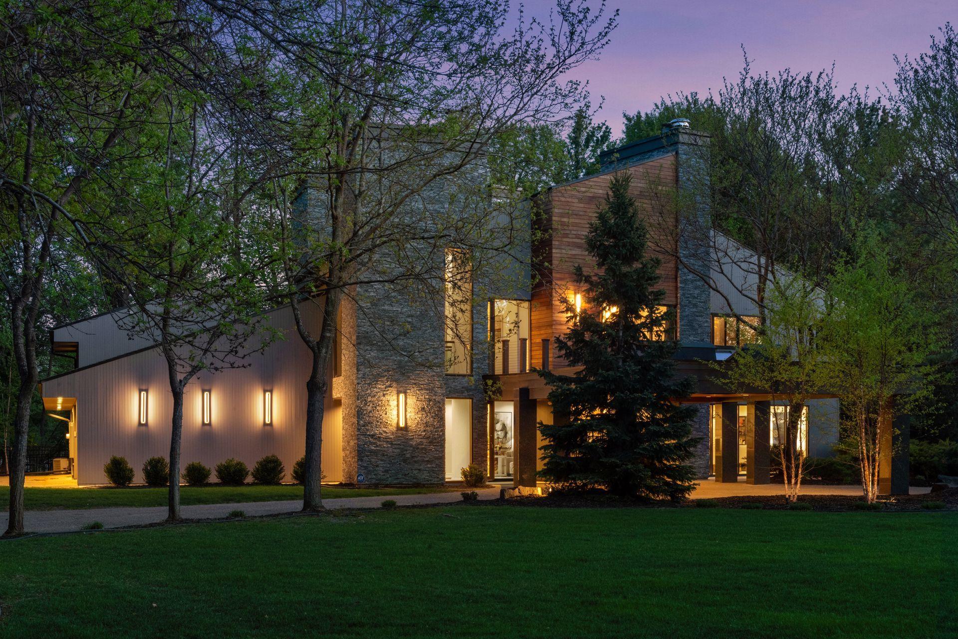 Introducing 45 Clay Cliffe Drive in beautiful Tonka Bay, Minnesota. Located within the prestigious Clay Cliffe neighborhood, the only gated community on Lake Minnetonka, this exceptional residence includes a private dock and offers an unparalleled bl