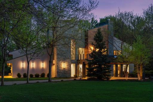 Introducing 45 Clay Cliffe Drive in beautiful Tonka Bay, Minnesota. Located within the prestigious Clay Cliffe neighborhood, the only gated community on Lake Minnetonka, this exceptional residence includes a private dock and offers an unparalleled bl