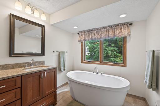 Updated ensuite with soaking/jacuzzi tub, double sinks with Cambria countertops