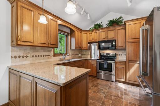 Newer vaulted kitchen with Cambria countertops