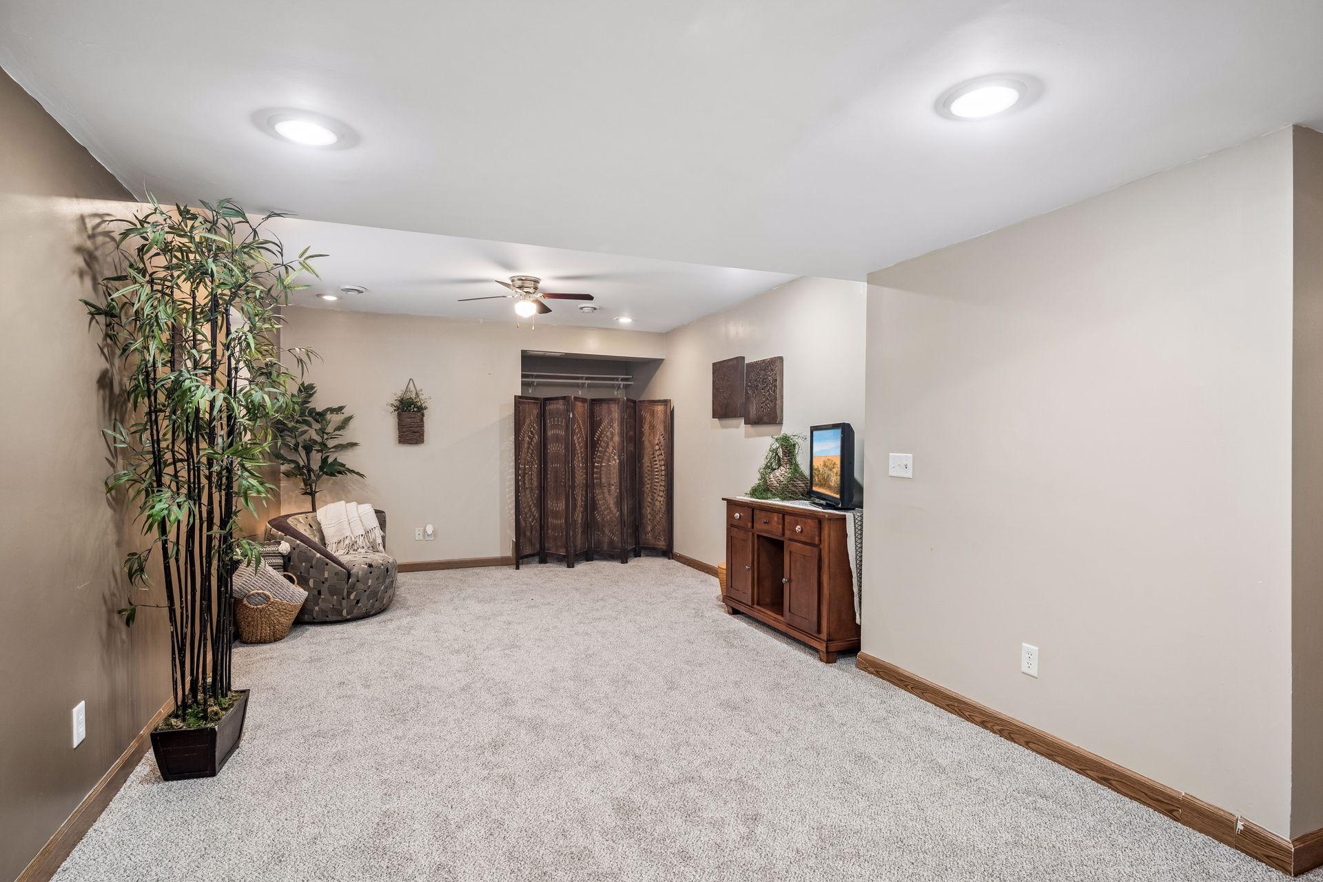 Spacious Family room with brand new carpet and paint.jpg