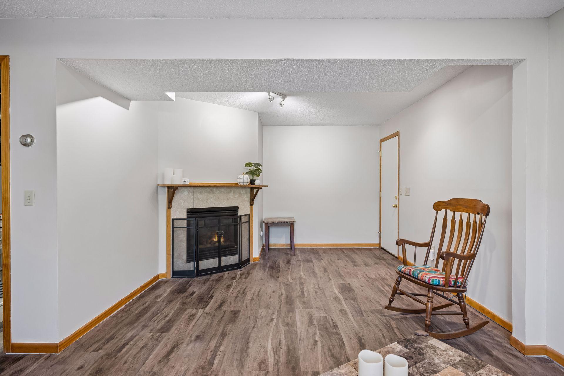 The lower lower level family room has a nice gas fireplace.