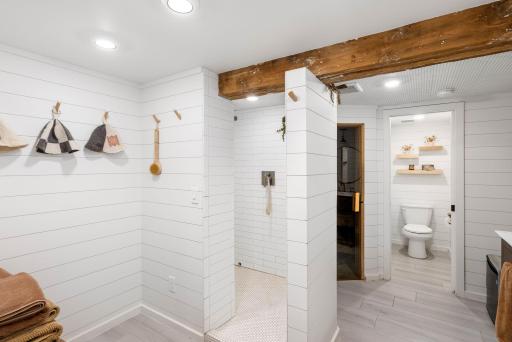 Spa-like Â¾ bathroom complemented by a relaxing private sauna.