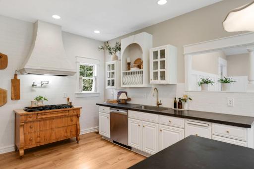 The kitchen is a true chefâs delight, blending functionality with timeless style and character.