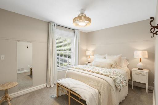 Bedroom four rounds out the upper level and is just steps from the shared upper-level bathroom.