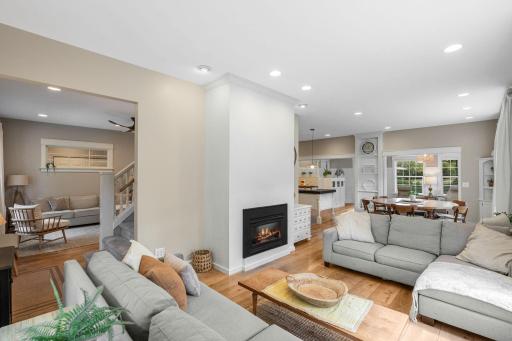 The other living room provides a cozy gas-burning fireplace, creating a warm and inviting gathering space.