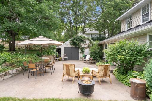 The spacious backyard patio is perfect for entertaining, while the charming detached garage adds character and versatility with ample space for additional storage and keeping outdoor equipment organized.