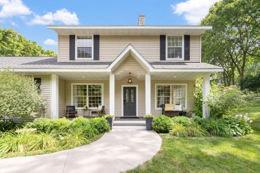 From the moment you arrive, impressive curb appeal and beautifully maintained landscaping set the tone. The inviting front porch provides the perfect spot to enjoy your morning coffee and take in the peaceful neighborhood.