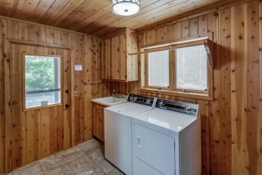 Nice back entry mud room with laundry and storage.