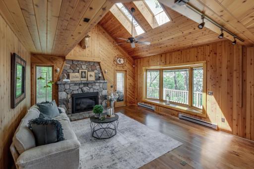 Main floor family room with fireplace and American Walnut Flooring