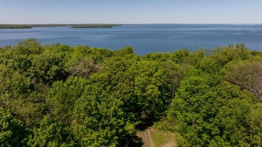 3.1 acres next door for sale or to combine with lake home.