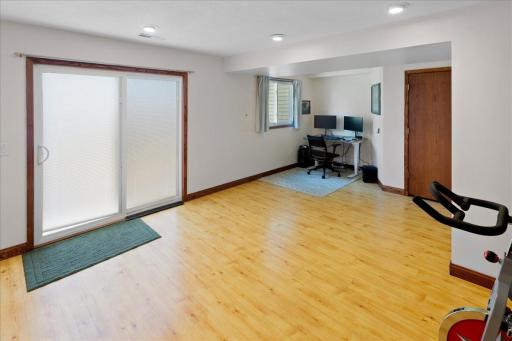 Large lower level rec room area with sliding glass door that opens to a patio area. You could easily add a 3rd bedroom in the lower level if you wanted!