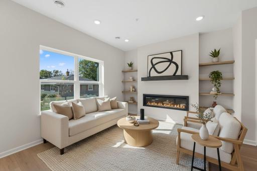 Family Room features electric fireplace and blinds - for illustrative purposes only