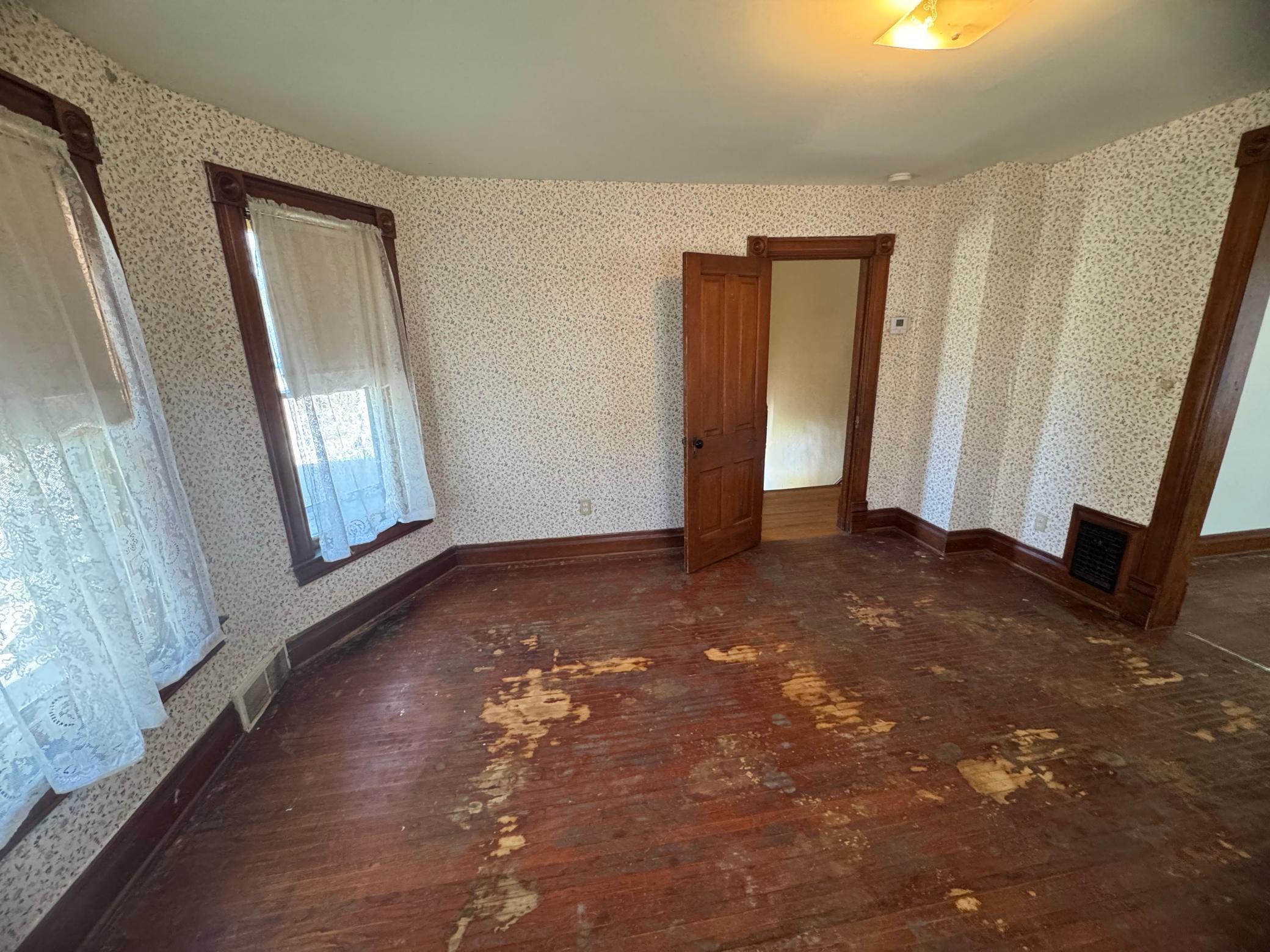 old carpet removed from hardwood
