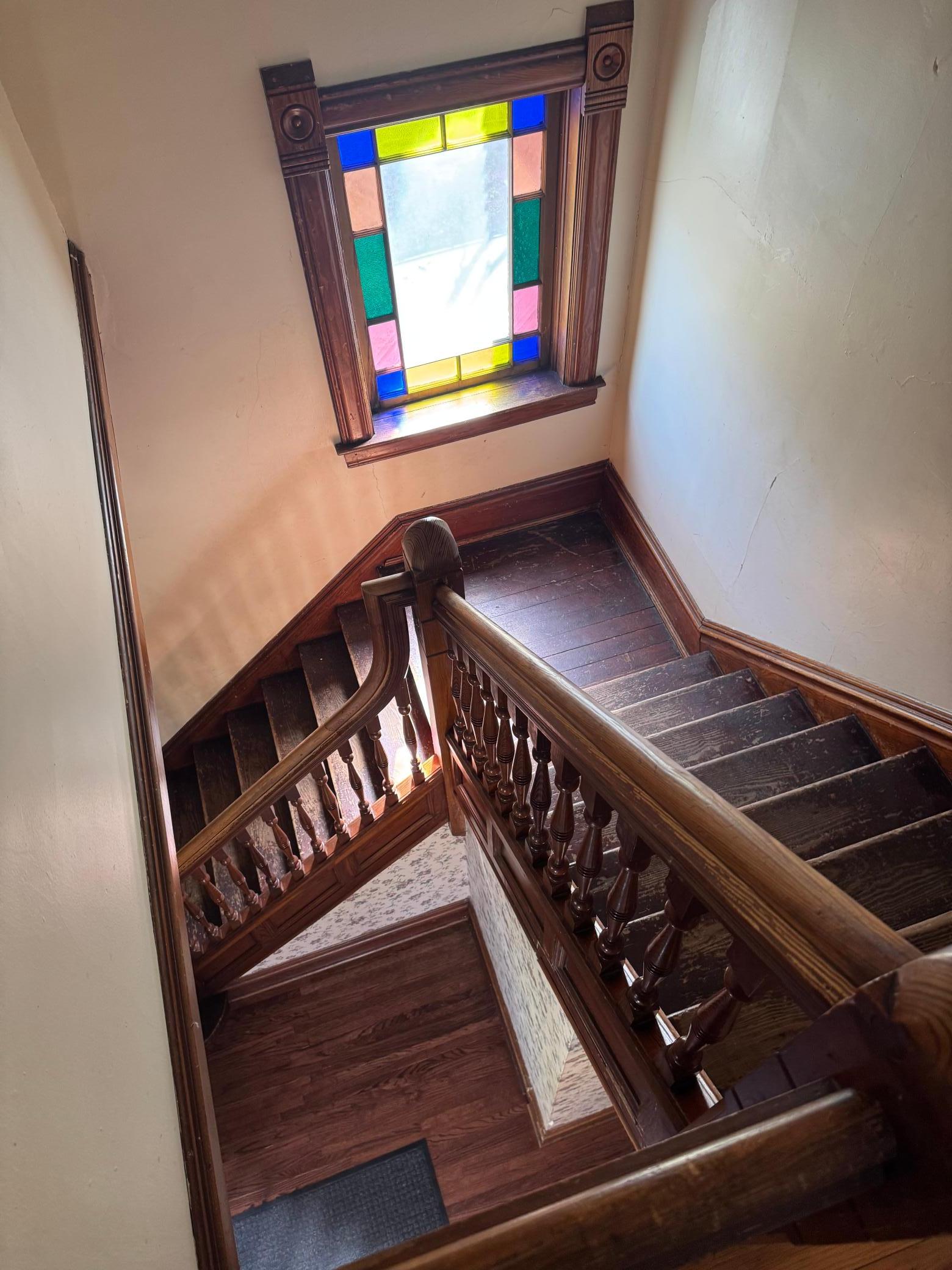 Classic staircase w stained glass