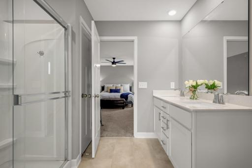 Dual sink vanity and shower in primary bath