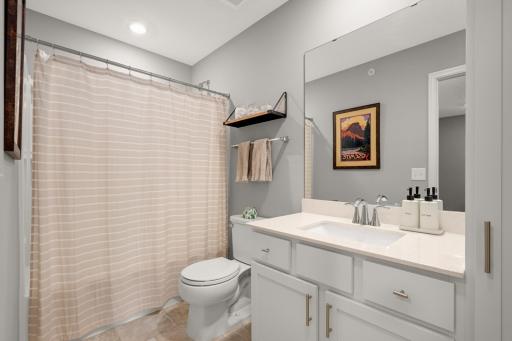 Oversized full bath on upper level with linen closet