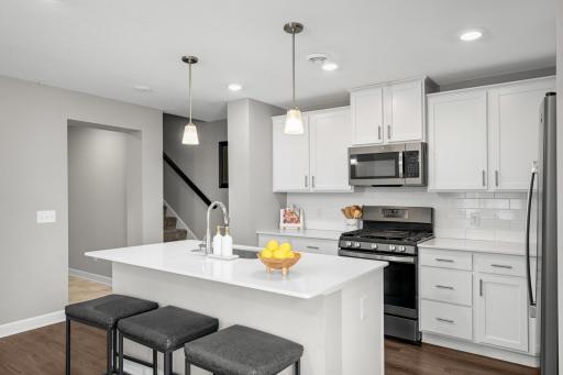 Wonderful large center island that offers snack bar seating