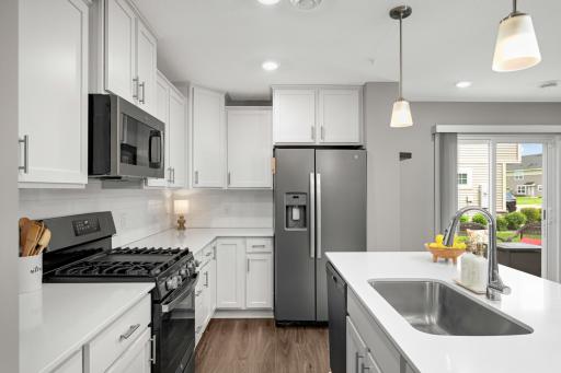 Upgraded gas stove with 5 burner that includes a griddle and refrigerator with water & ice