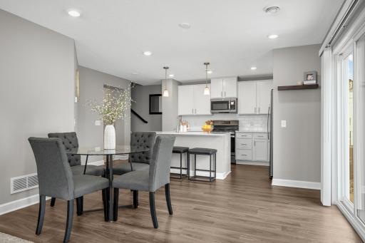 Gorgeous luxury vinyl flooring accented with enameled trim