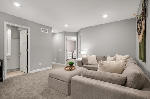 Generous sized loft that gives a second area to watch TV or relax