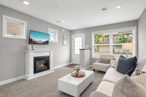 Living room offers boxed windows for additional sunlight
