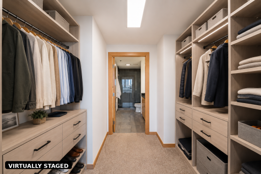Free-standing closet wardrobes have been virtually staged.