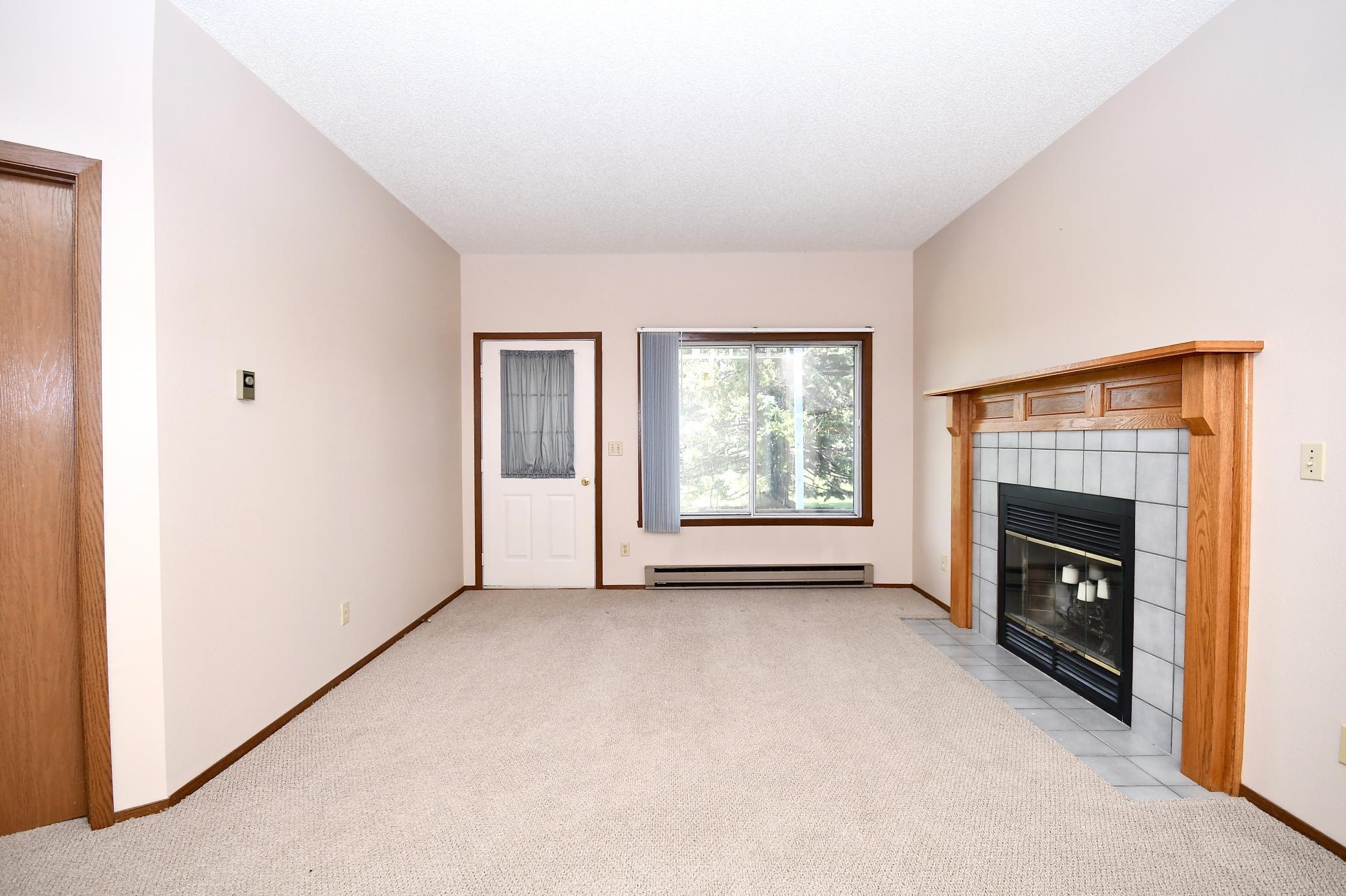 living room wood burning fireplace