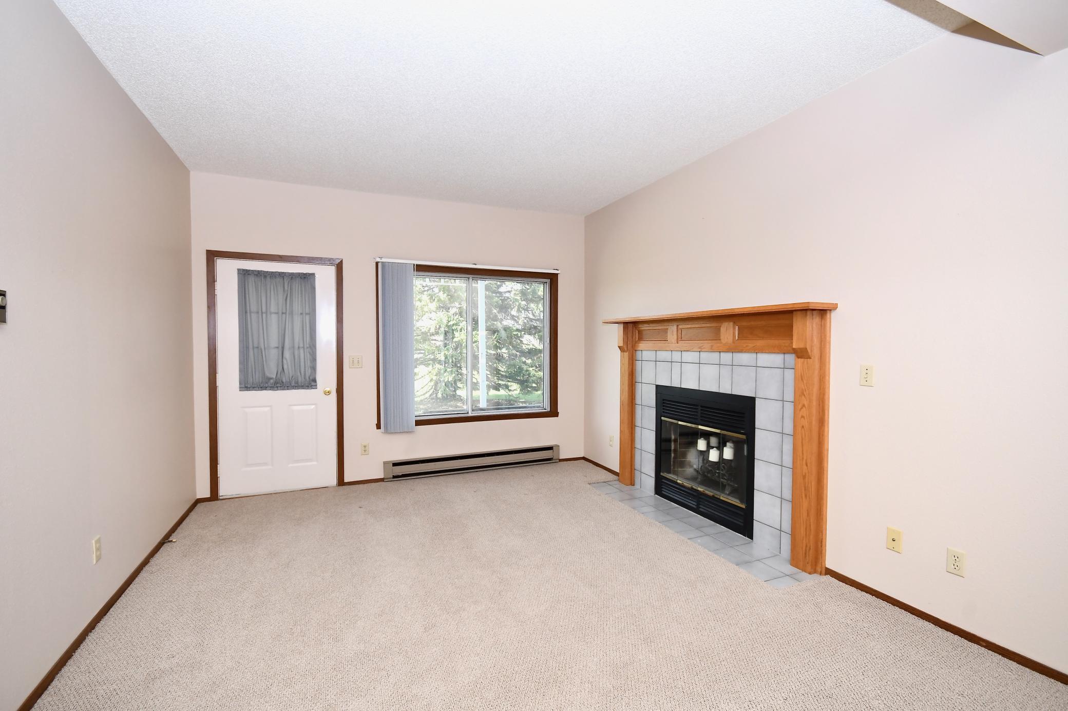 living room wood burning fireplace