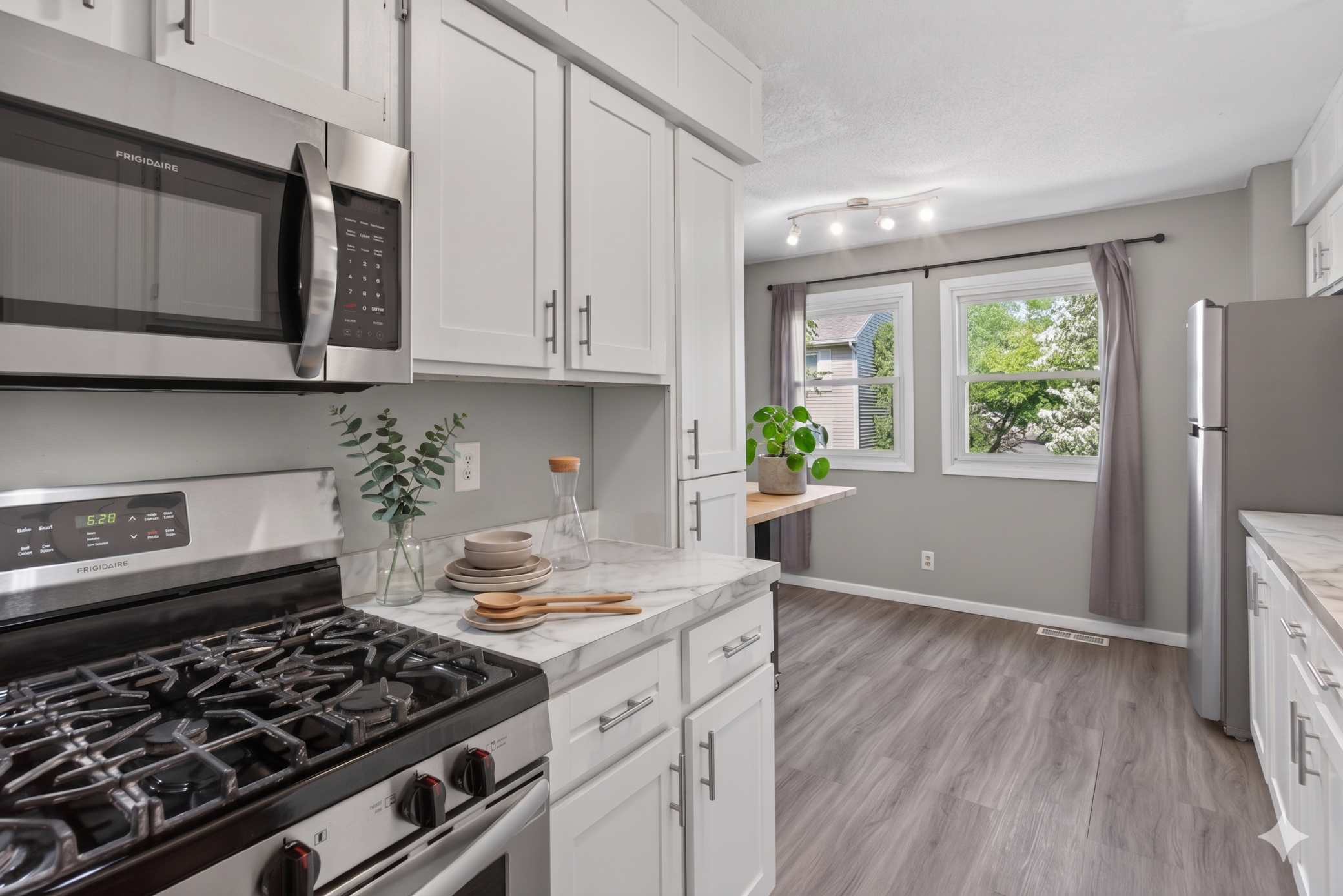 Main level: kitchen (virtually staged)