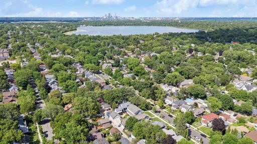 Aerial view in the heart of Fulton giving you all the charm to enjoy convenience, Lake Harriet, Lake Harriet Bandshell, biking, walking, fine dining and boutiques right out your doorstep. Home was built on 1 1/2 half city lots so extra yard space.
