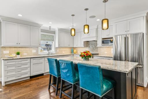 Countertop eating for convenience with center island that also offers storage.