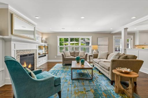 View into the backyard and main level family room from the front living room.