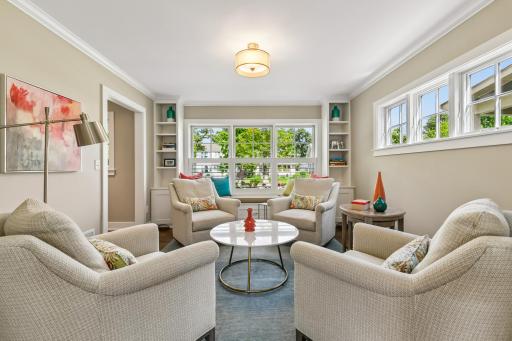 Enjoy this cozy front living room set off by glass pocket doors if you seek some additional space to entertain or enjoy friends.