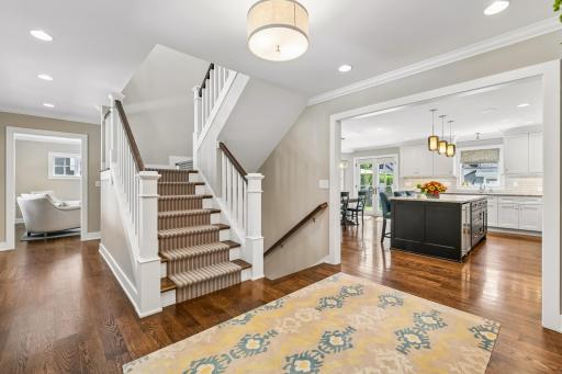Crisp interior with stunning plank hardwood floors on the main. An interior designer helped seller pick out every detail to this impressive turnkey home that is filled with tons of sunlight from all corners.