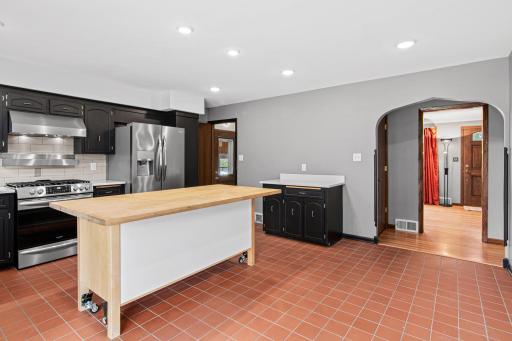 Spacious updated kitchen with newer ceramic tile.jpg