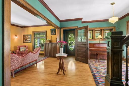 Elegant sun-filled, open entry space with music room.