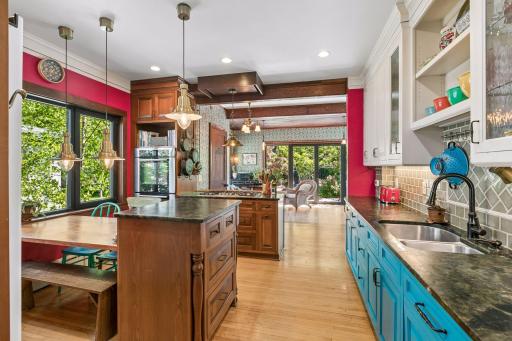 Large eat-in kitchen opens up to main floor family room and backyard.