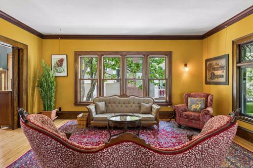 New, larger windows in living room provide so much natural light.