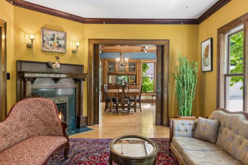 Beautiful original doors provide privacy for living and/or dining spaces.