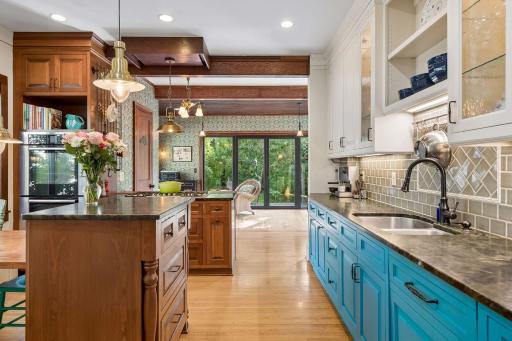 Kitchen opens up to the family room and back yard