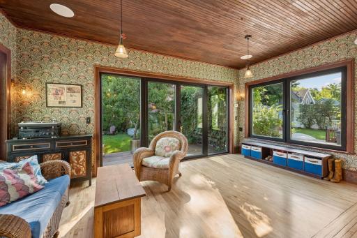 Main floor family room has amazing large windows and great connectivity to the backyard.