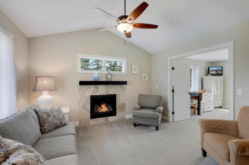 This sun room is also a great place to snuggle up and enjoy the fire in cooler months of the year