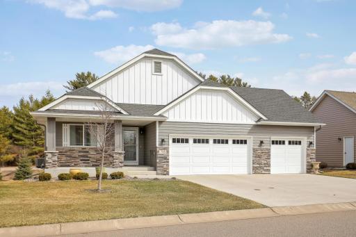 Attractive curb appeal with a front porch to relax on and a spacious concrete drive