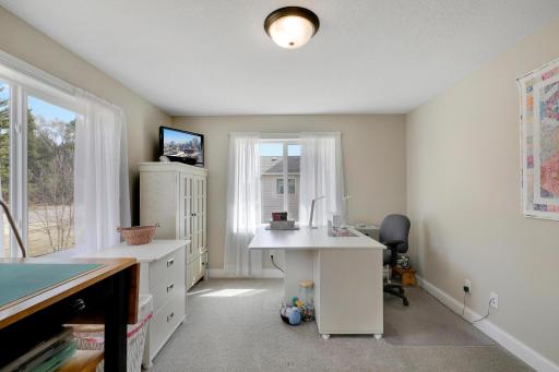 This flex room is currently used as a sewing room and would also be great as an office, craft room, or third bedroom (needs a closet)