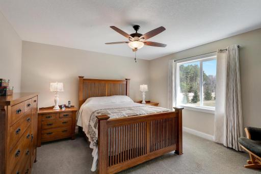 Primary bedroom boasts a full bath and walk-in closet