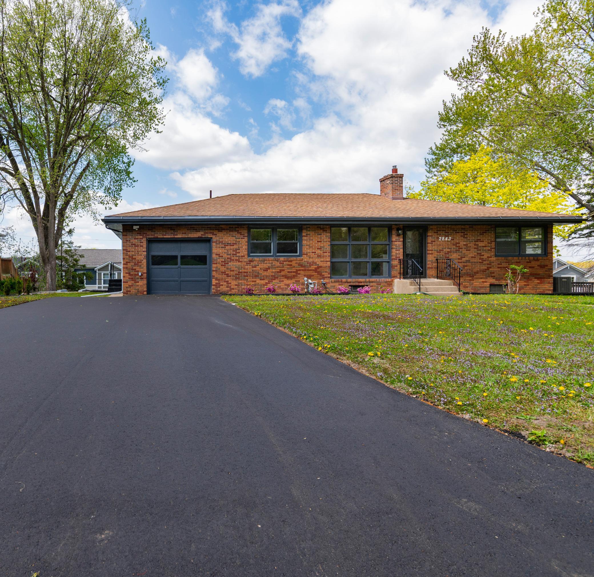 Brand new driveway with room on the side for additional off street parking.