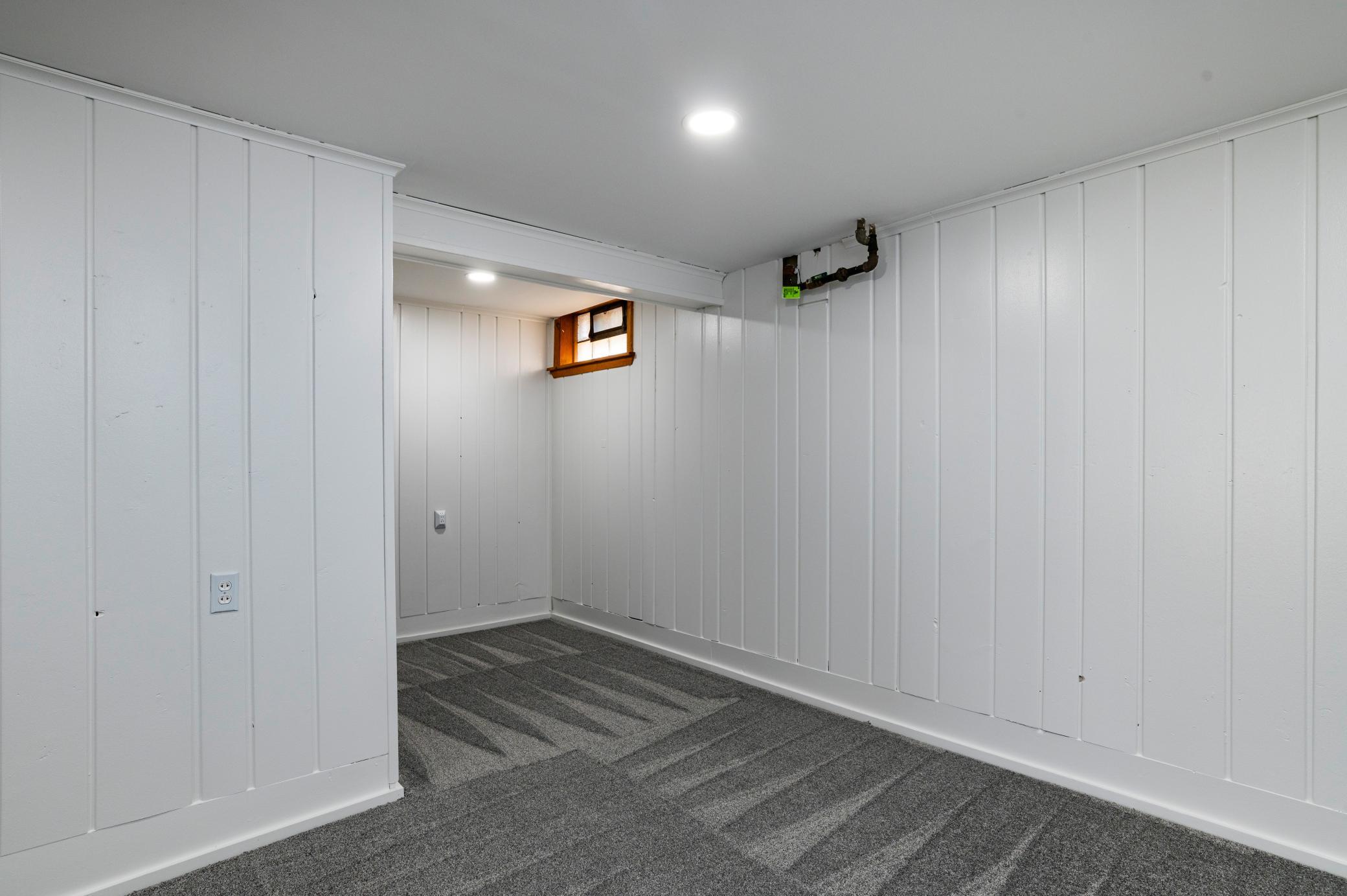 One of the large bonus rooms in the lower level, could easily become additional legal bedrooms by adding an egress window.