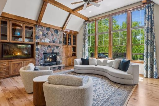 Relax in the cozy living room and enjoy your own private wooded view of the backyard. Anderson windows throughout the home. The windows on the back side of the home are equipped with a 3M window tint.